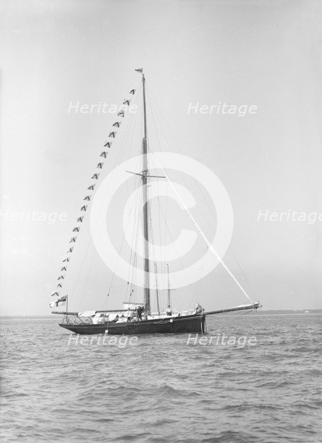 'Bloodhound' at anchor with flags, 1913. Creator: Kirk & Sons of Cowes.