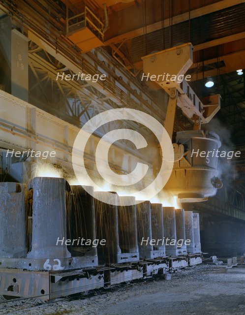 Teeming (pouring) steel ingots, Park Gate Iron and Steel Co, Rotherham, South Yorkshire, 1965. Artist: Michael Walters