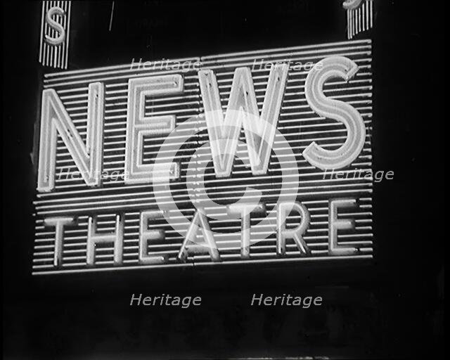 Illuminated Sign. Sign Reads: 'News Theatre', 1931. Creator: British Pathe Ltd.