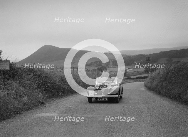 Jensen open 4-seater of Ken Crawford competing in the South Wales Auto Club Welsh Rally, 1937 Artist: Bill Brunell.