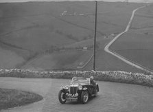 MG TA of WC Reid competing in the RAC Rally, 1939. Artist: Bill Brunell.