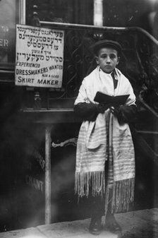 Jew[ish] New Year - boy in prayer shawl, 1911. Creator: Bain News Service.