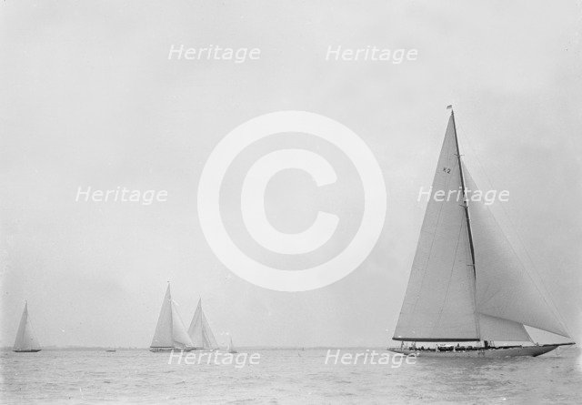 The 23-metre cutter 'Astra' sailing close-hauled, 1935. Creator: Kirk & Sons of Cowes.