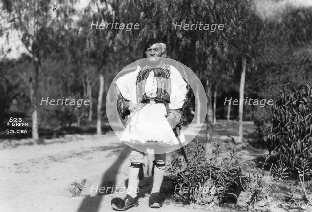 A Greek soldier in traditional uniform, c1920s-c1930s(?). Artist: Unknown