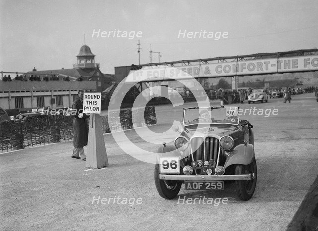 SS 2 competing in the JCC Rally, Brooklands, Surrey, 1939. Artist: Bill Brunell.