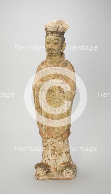 Standing Court Official, Style of Tang Dynasty (618-907) with later painted detail. Creator: Unknown.