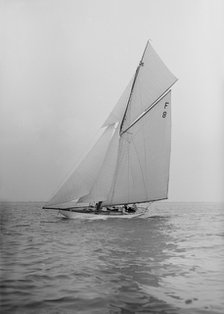 The International 10 Metre class 'Pampero' (F8) sailing close-hauled, 1913. Creator: Kirk & Sons of Cowes.