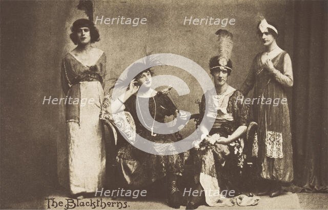 Amateur actors in drag, pose on stage as "The Blackthorns", (between 1910 and 1919?). Creator: Unknown.