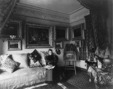 Brazilian Legation - Mendonca residence - Mme. Medonca seated in her boudoir, between 1890 and 1950. Creator: Frances Benjamin Johnston.