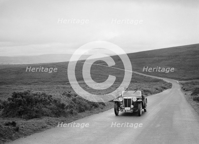 MG TA of RA MacDermid, winner of a bronze award at the MCC Torquay Rally, July 1937. Artist: Bill Brunell.