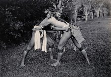 Sarawak: two Kayans wrestling, c1900. Creator: Unknown.