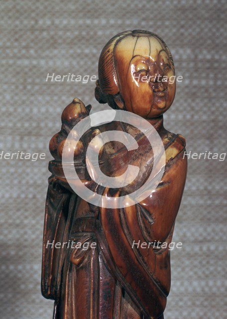 Ivory Chinese figurine of an attendent to Hsi Wang Mu, 17th century. Artist: Unknown