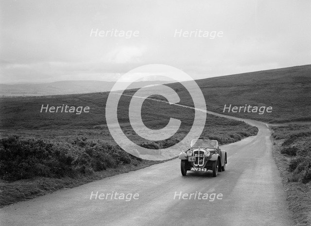 Austin 7 of JG Orford, winner of a premier award at the MCC Torquay Rally, July 1937. Artist: Bill Brunell.