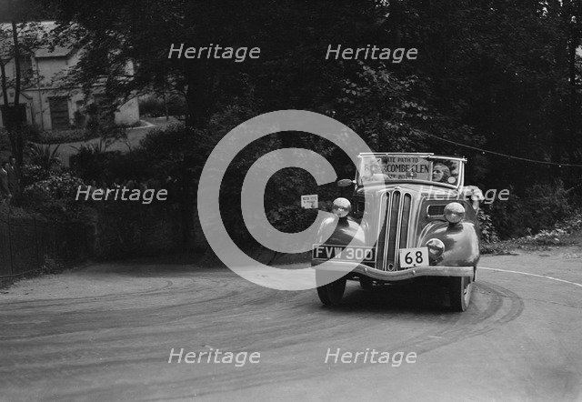 Ford Model C 10 of J McEvoy competing in the MCC Torquay Rally, Torbay, Devon, 1938. Artist: Bill Brunell.