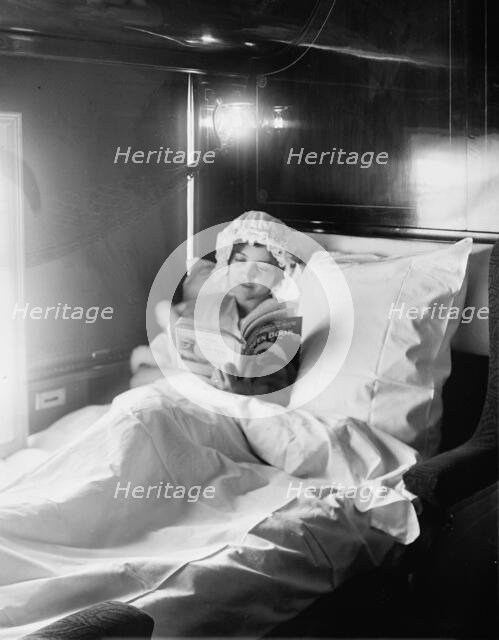 Electric-lighted berth on a deluxe overland limited train, between 1910 and 1920. Creator: William H. Jackson.