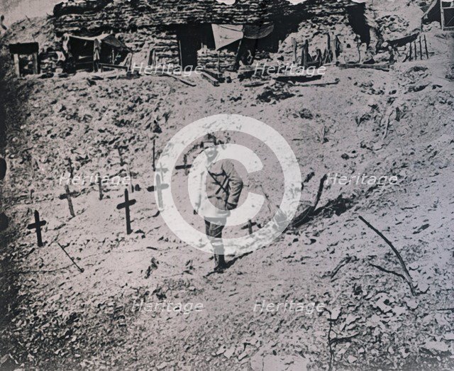 Soldier among wooden crosses, c1914-c1918. Artist: Unknown.