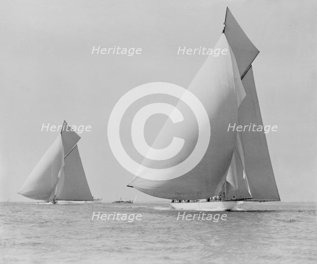 The sailing yachts 'White Heather' and 'Shamrock', race downwind. Creator: Kirk & Sons of Cowes.