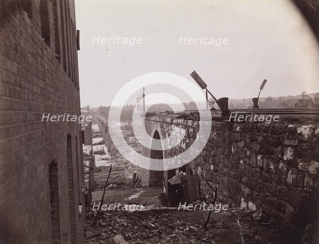 Ruins of Richmond & Petersburg Railroad Bridge, Richmond, Virginia, ca. 1865. Creator: Alexander Gardner.