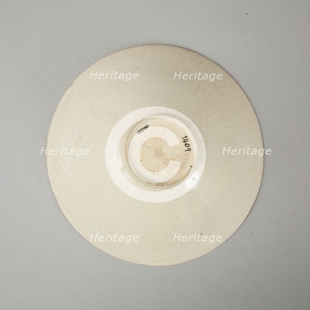 Lobed bowl with qingbai glaze with carved floral design made in the Northern Song dynasty. Artist: Unknown.