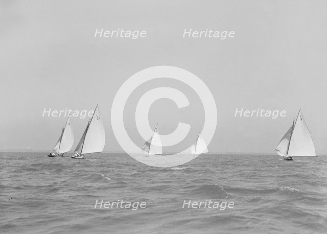 Group of 6 Metres racing downwind, 1911. Creator: Kirk & Sons of Cowes.