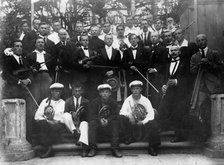 Mikhail Alekseevich Pavlov with the Members of a Symphony Orchestra, 1920s. Creator: Unknown.