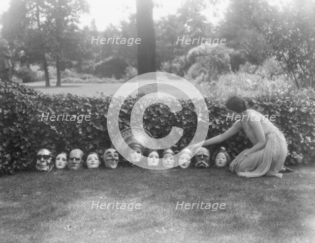 Display of masks made by W.T. Benda, not before 1925 Sept. 20. Creator: Arnold Genthe.