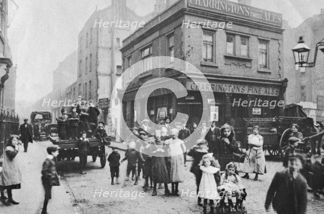 Busy East End street scene, London, 1912. Artist: Unknown