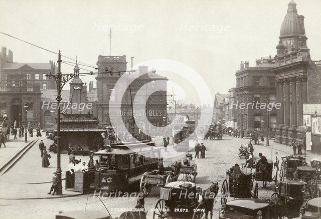 Horse-drawn taxis and electric trams on Fitzalan Square, Sheffield, Yorkshire, c1900 Creator: GW Wilson and Company.