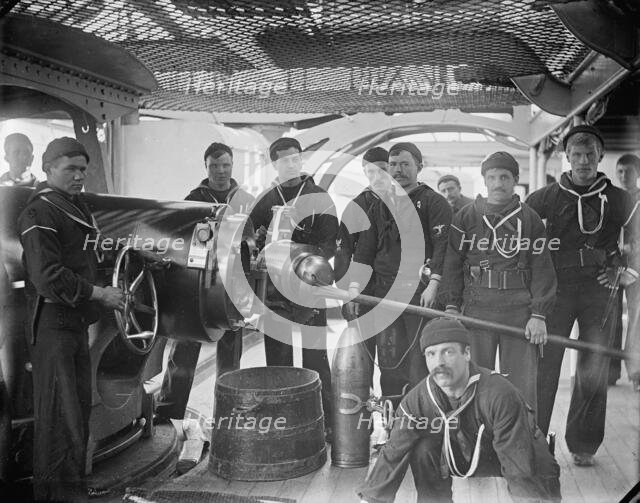 U.S.S. New York, breech of 8 inch gun and crew, between 1893 and 1901. Creator: William H. Jackson.