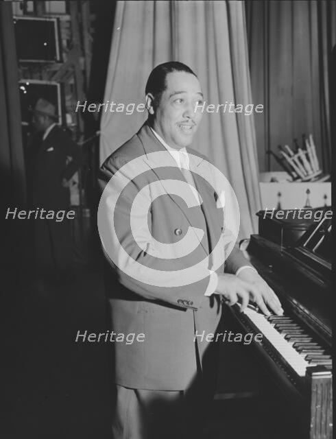 Portrait of Duke Ellington, Howard Theater(?), Washington, D.C., ca. June 1946. Creator: William Paul Gottlieb.