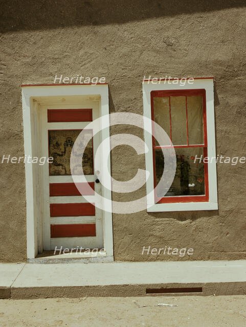 Door and window in a Spanish-American home, Costilla, New Mexico, 1940. Creator: Russell Lee.