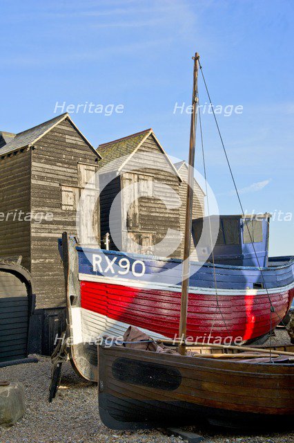Fishing boat on the beach in front of the 'net shops', Hastings, East Sussex, c1980-c2017. Artist: Historic England Staff Photographer.