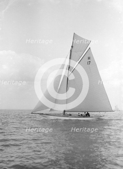 The 8 Metre 'Ierne' sailing close-hauled, 1913. Creator: Kirk & Sons of Cowes.