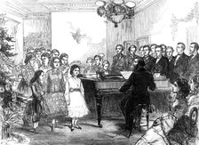 Christmas party at the Royal Normal College of Music for the Blind, 1874. Creator: Unknown.