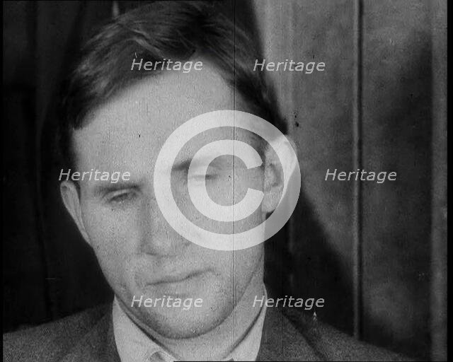 Bruno Richard Hauptmann Being Presented To the Press by the New York Police Department, 1930s. Creator: British Pathe Ltd.