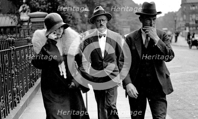 Nora Barnacle (left), James Joyce (center) and their solicitor n London on the day of their marriage