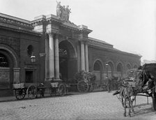 Municipal building and street scene - possibly Ireland, c1890s. Creator: Robert Augustus Henry L'Estrange.