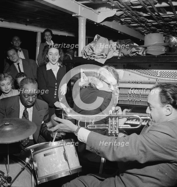 Portrait of Marty Marsala, Bunty Pendelton, and Baby Dodds, Riverboat on the Hudson, N.Y., 1947. Creator: William Paul Gottlieb.