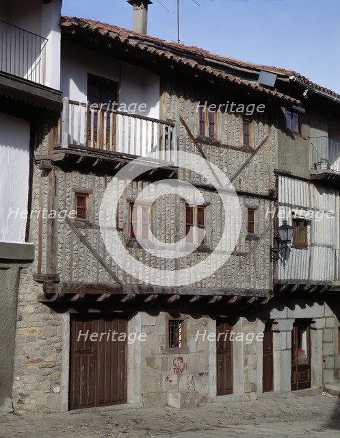 Street of La Alberca (Salamanca), and a house façade.