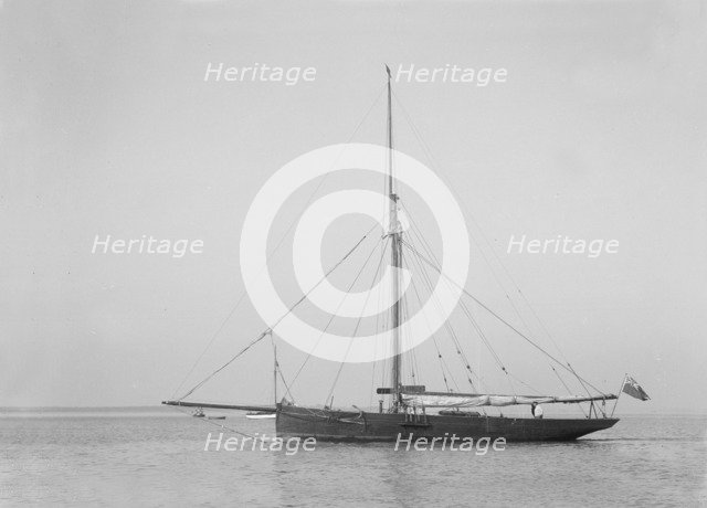 The cutter 'Cymberline' under way by motor. Creator: Kirk & Sons of Cowes.