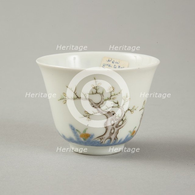 Underglaze blue month cup with polychrome enamelled decoration of a prunus tree. Artist: Unknown.