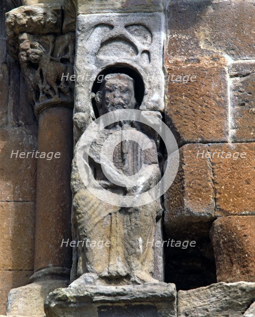 Seated statue on the façade of the church of Santo Domingo de Soria, supposedly the king Alfonso …