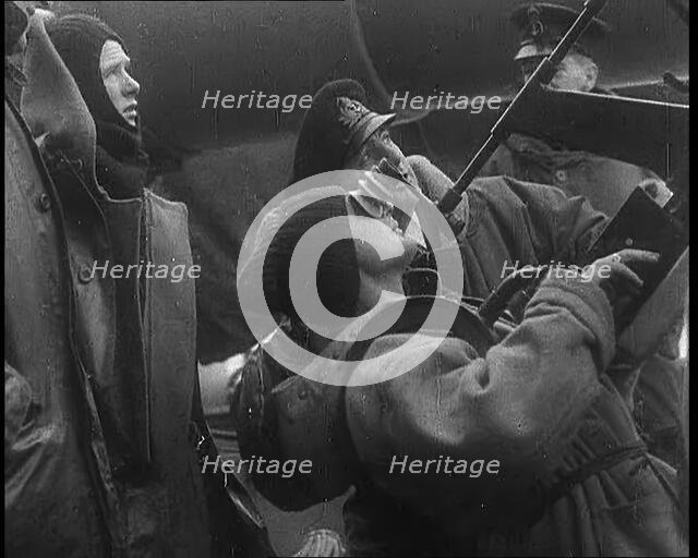 British Sailor Firing an Anti Aircraft Gun in Norwegian Coastal Waters, 1940. Creator: British Pathe Ltd.