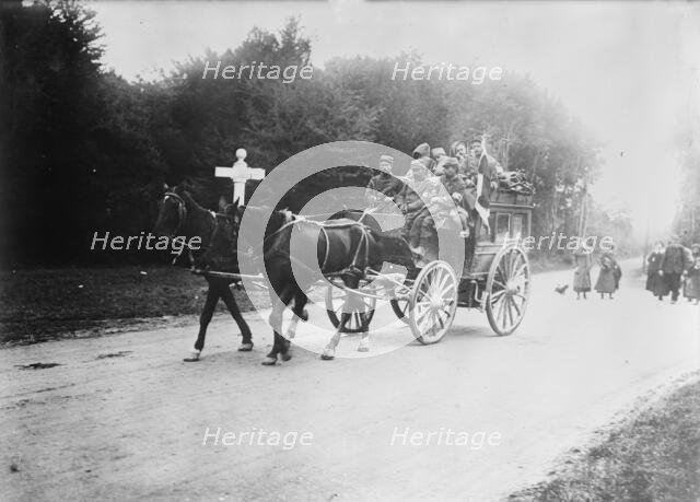 Red Cross Transport in Forest of Laigle (i.e., Laigne), 1914. Creator: Bain News Service.