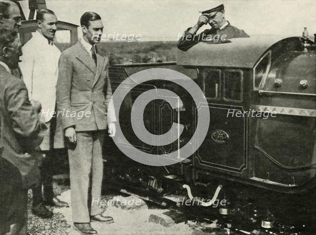 'His Majesty Inspecting The Miniature Railway at New Romney, Kent, 1926', 1937. Creator: Unknown.