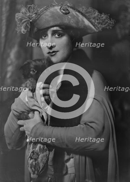 Cowl, Jane, Miss, with dog, portrait photograph, 1918 Oct. 14. Creator: Arnold Genthe.