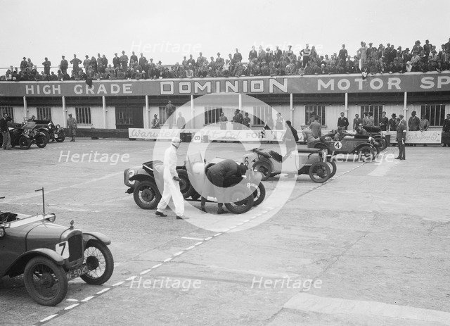 Cars on the start line at the JCC Members Day, Brooklands, 4 July 1931. Artist: Bill Brunell.