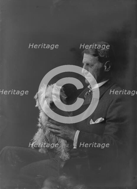 Mr. Arthur Young, with dog, portrait photograph, 1918 Oct. 1. Creator: Arnold Genthe.