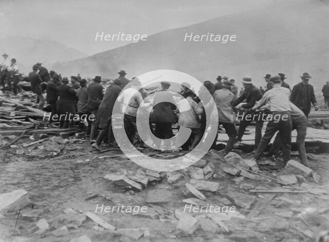 Rescuers at Austin pulling down ruins, between c1910 and c1915. Creator: Bain News Service.