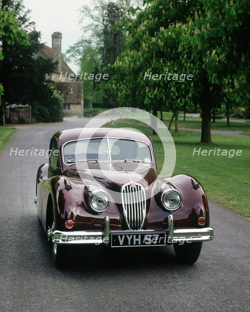 1957 Jaguar XK 140 Artist: Unknown.